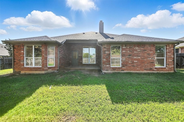 713 Madeline Ct, Azle, TX 76020 - rear view of property with a chimney, brick siding, a patio area, and roof with shingles