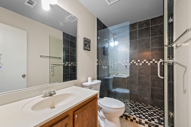 3060 Saint Nicholas Dr, Dallas, TX 75233 - full bathroom featuring vanity, a shower stall, and tile patterned flooring