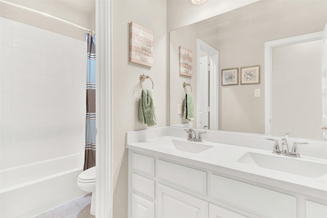 9809 Trinity Dr, Little Elm, TX 75068 - full bath featuring double vanity, shower / bath combination with curtain, and tile patterned floors