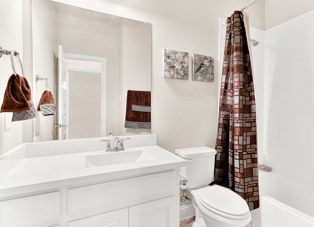 9809 Trinity Dr, Little Elm, TX 75068 - bathroom featuring vanity and shower / bathtub combination with curtain