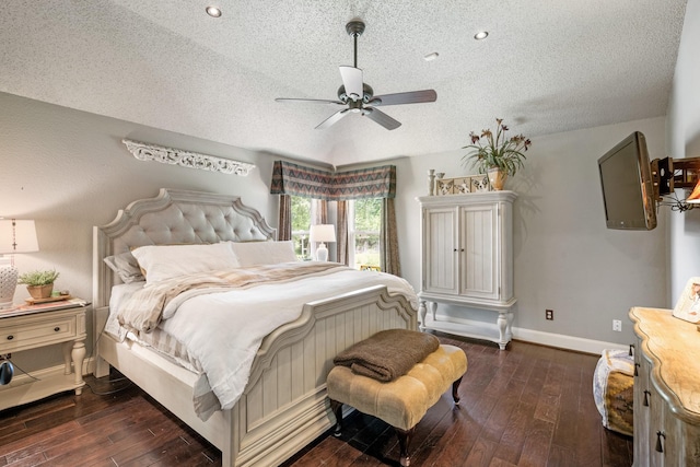 3901 Woodside Dr, Arlington, TX 76016 - bedroom with a textured ceiling, dark wood-style flooring, and ceiling fan