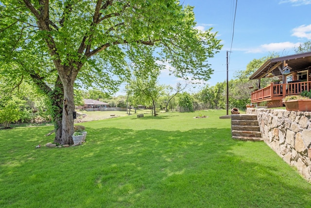 3901 Woodside Dr, Arlington, TX 76016 - view of grassy yard featuring a deck