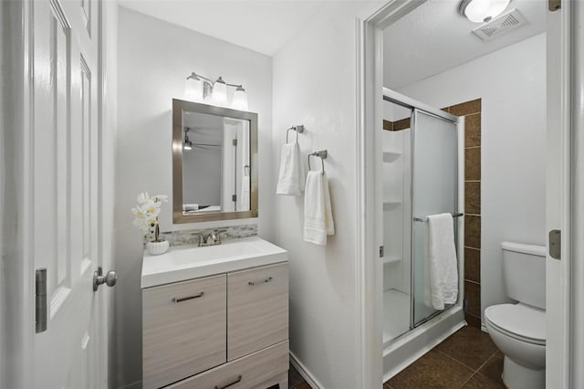515 Signal Hill Ct S, Fort Worth, TX 76112 - bathroom with vanity, a stall shower, tile patterned floors, and ceiling fan