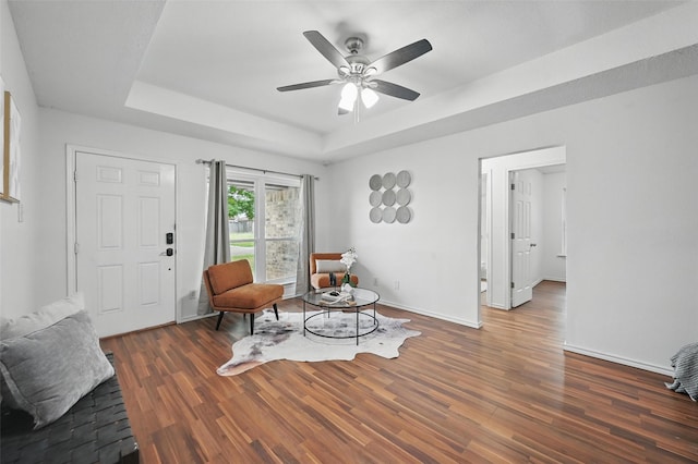 515 Signal Hill Ct S, Fort Worth, TX 76112 - sitting room featuring a raised ceiling, wood finished floors, and ceiling fan