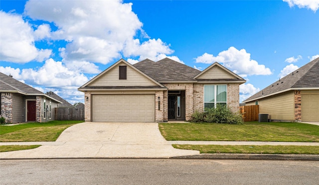 4020 Centerfire Rd, Waco, TX 76705 - view of front of home featuring brick siding, an attached garage, and driveway