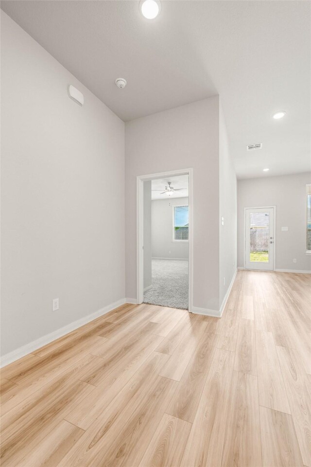 4020 Centerfire Rd, Waco, TX 76705 - empty room featuring light wood-style floors, a smoke detector, ceiling fan, and recessed lighting