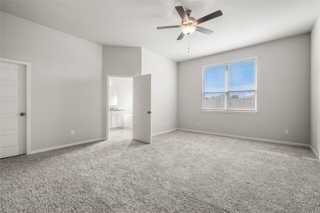 4020 Centerfire Rd, Waco, TX 76705 - unfurnished bedroom with carpet floors, connected bathroom, and ceiling fan