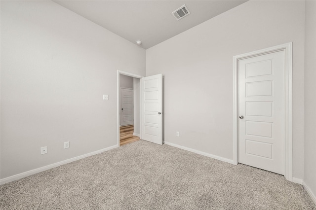 4020 Centerfire Rd, Waco, TX 76705 - unfurnished bedroom with light carpet and vaulted ceiling