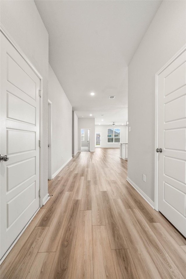 4020 Centerfire Rd, Waco, TX 76705 - unfurnished living room featuring light wood-type flooring and recessed lighting