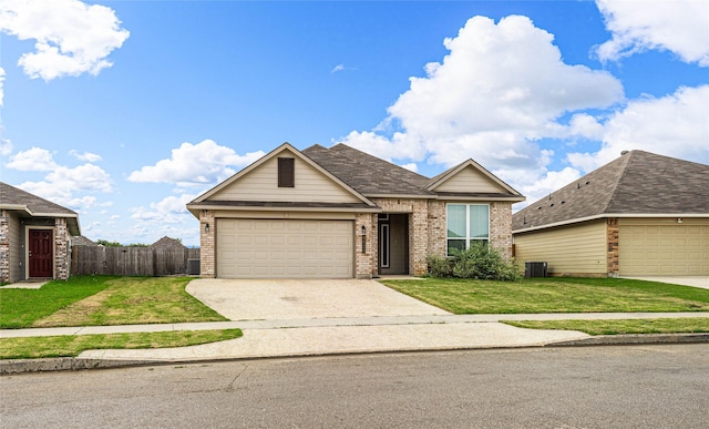 4020 Centerfire Rd, Waco, TX 76705 - traditional-style home with brick siding, concrete driveway, and a garage