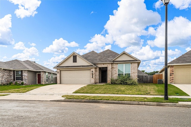 4020 Centerfire Rd, Waco, TX 76705 - view of front of house featuring brick siding, an attached garage, and concrete driveway