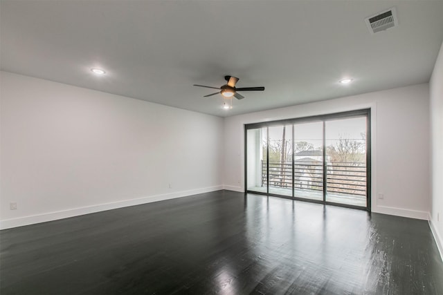 407 Dubois Ave, Dallas, TX 75203 - empty room featuring a ceiling fan, dark wood-style floors, and recessed lighting