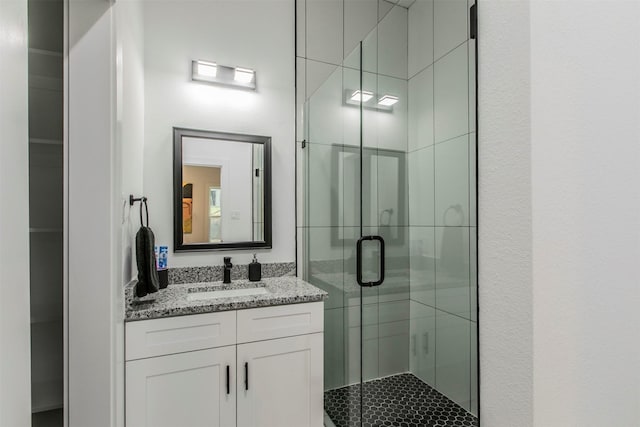 407 Dubois Ave, Dallas, TX 75203 - bathroom featuring a stall shower and vanity