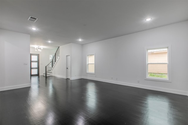 407 Dubois Ave, Dallas, TX 75203 - unfurnished room with plenty of natural light, recessed lighting, and dark wood finished floors