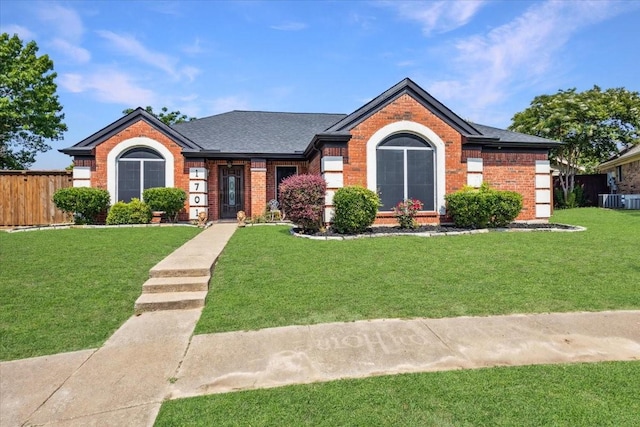 1701 Prairie Creek Ct, Garland, TX 75040 - view of front of property with brick siding and roof with shingles