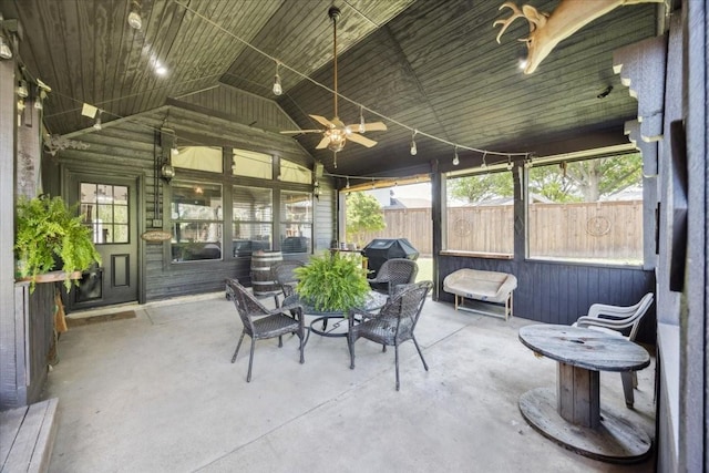 1701 Prairie Creek Ct, Garland, TX 75040 - sunroom / solarium featuring ceiling fan, vaulted ceiling, and outdoor dining space