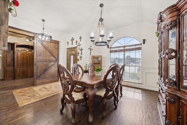 1701 Prairie Creek Ct, Garland, TX 75040 - dining room featuring a chandelier, dark wood-style floors, and ornamental molding