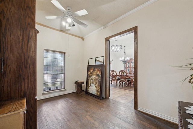 1701 Prairie Creek Ct, Garland, TX 75040 - empty room featuring wood finished floors, a chandelier, crown molding, and ceiling fan