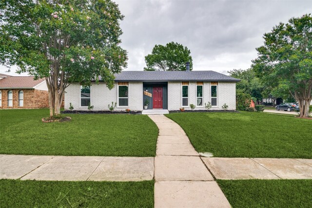 601 Red Ash Cir, Mesquite, TX 75150 - view of front of house with a front lawn and brick siding
