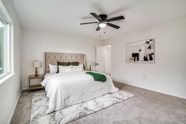 601 Red Ash Cir, Mesquite, TX 75150 - carpeted bedroom with multiple windows and ceiling fan