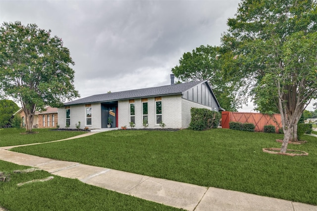601 Red Ash Cir, Mesquite, TX 75150 - view of front facade with brick siding and board and batten siding