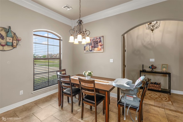 615 Canoe Trl, Bossier City, LA 71111 - dining area with a chandelier, arched walkways, and ornamental molding