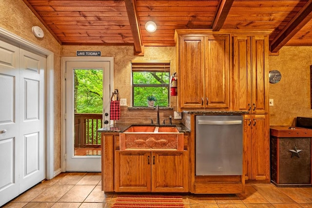 188 Hacienda, Pottsboro, TX 75076 - kitchen featuring dishwasher, a wood ceiling with exposed beams, light tile patterned floors, brown cabinets, and dark stone countertops