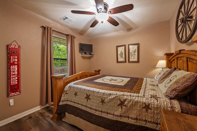 188 Hacienda, Pottsboro, TX 75076 - bedroom featuring dark wood-style flooring and ceiling fan