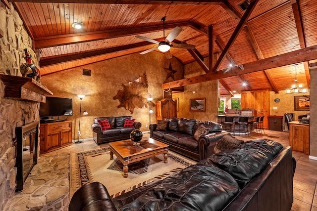 188 Hacienda, Pottsboro, TX 75076 - living room featuring a wood ceiling with exposed beams, ceiling fan, a stone fireplace, and high vaulted ceiling