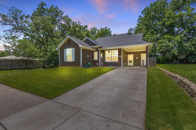 409 N Houston Ave, Denison, TX 75021 - view of front facade featuring driveway and roof with shingles