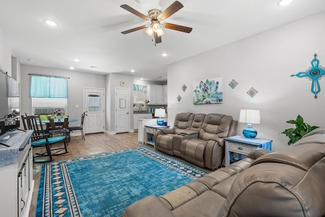 409 N Houston Ave, Denison, TX 75021 - living room featuring ceiling fan, light wood-type flooring, and recessed lighting