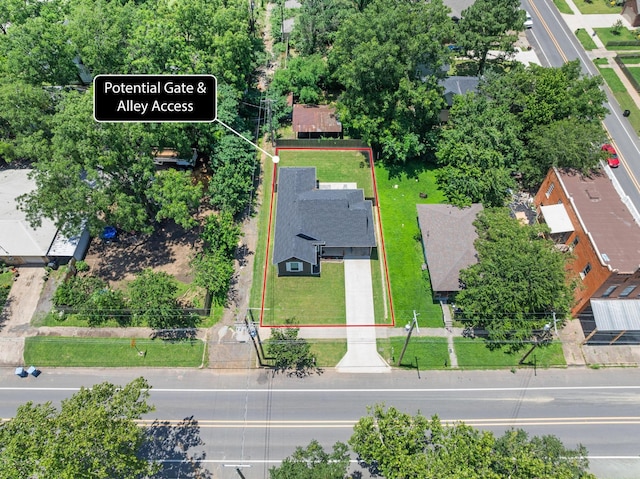 409 N Houston Ave, Denison, TX 75021 - aerial view of property and surrounding area with property boundaries highlighted