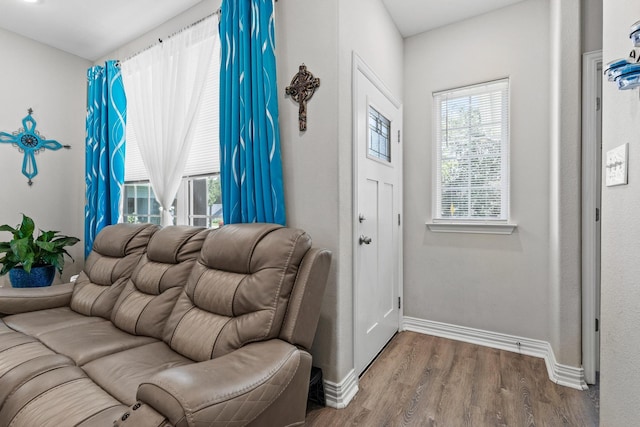 409 N Houston Ave, Denison, TX 75021 - entryway featuring baseboards and wood finished floors