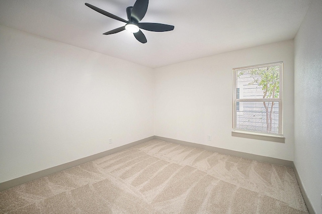 5525 Lester Granger Dr, Fort Worth, TX 76112 - empty room featuring light carpet and ceiling fan