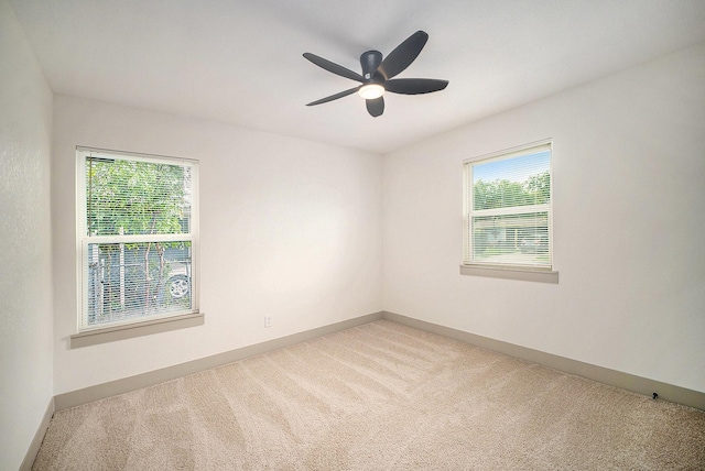 5525 Lester Granger Dr, Fort Worth, TX 76112 - unfurnished room with light carpet and ceiling fan