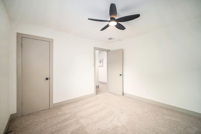 5525 Lester Granger Dr, Fort Worth, TX 76112 - unfurnished bedroom with light carpet and a ceiling fan