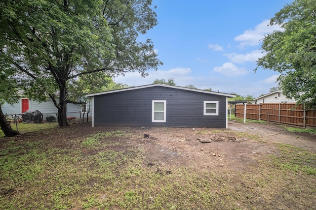 5525 Lester Granger Dr, Fort Worth, TX 76112 - back of house featuring a fenced backyard