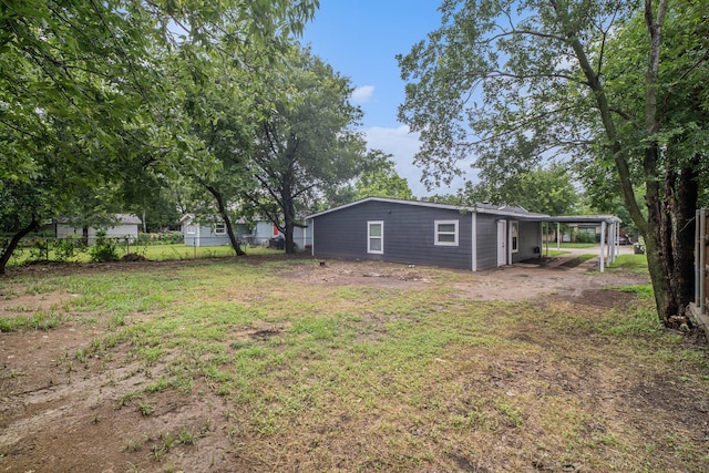 5525 Lester Granger Dr, Fort Worth, TX 76112 - view of yard with a carport