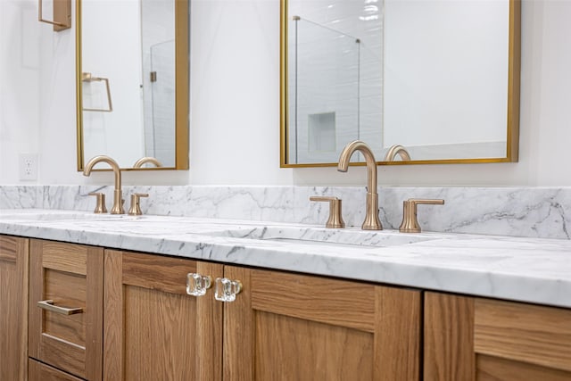 350 O Connor Ridge Blvd Unit 12, Irving, TX 75038 - bathroom featuring double vanity and an enclosed shower