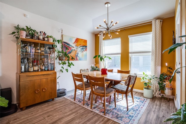 436 Buckeye Ave, Princeton, TX 75407 - dining room with a chandelier and wood finished floors