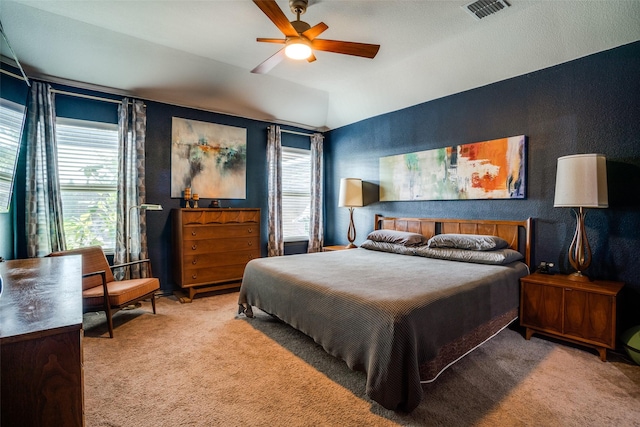 436 Buckeye Ave, Princeton, TX 75407 - bedroom featuring carpet floors, vaulted ceiling, a textured wall, and a ceiling fan