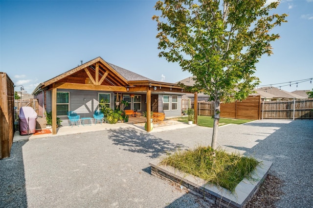 436 Buckeye Ave, Princeton, TX 75407 - back of property featuring a patio area and a fenced backyard