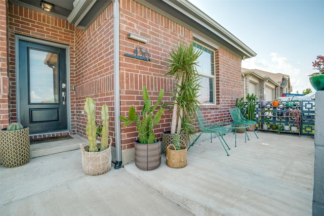 436 Buckeye Ave, Princeton, TX 75407 - doorway to property with brick siding
