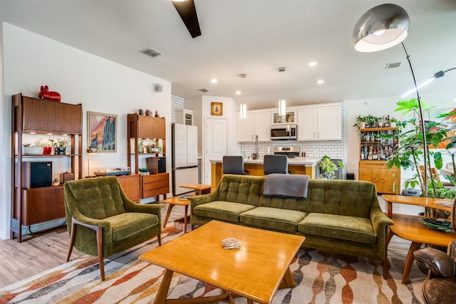 436 Buckeye Ave, Princeton, TX 75407 - living room with light wood-style flooring and recessed lighting