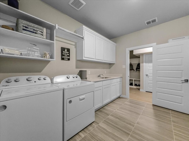 413 Coyote Creek Dr, Lavon, TX 75166 - washroom with washer and clothes dryer and cabinet space