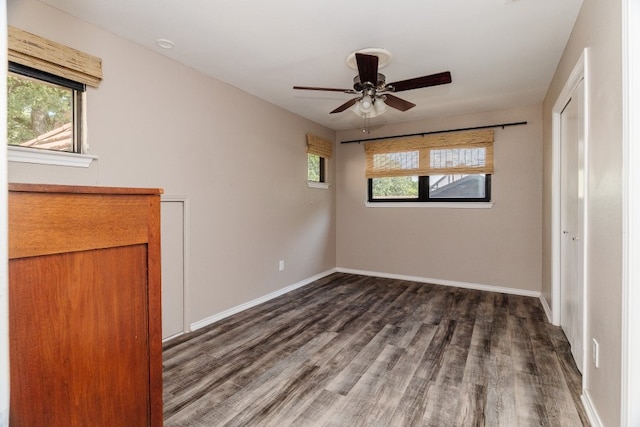 2304 Wakeforest Ct, Arlington, TX 76012 - unfurnished bedroom featuring wood finished floors and baseboards