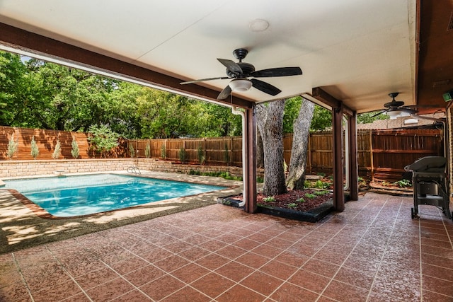 2304 Wakeforest Ct, Arlington, TX 76012 - view of swimming pool with a ceiling fan, a patio area, and area for grilling