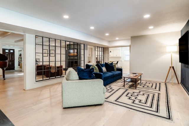 2304 Wakeforest Ct, Arlington, TX 76012 - living room featuring light wood-style flooring and recessed lighting