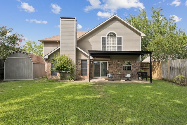 113 Windmill Ridge Dr, Rockwall, TX 75032 - back of property with a patio, a storage shed, a fenced backyard, brick siding, and a chimney