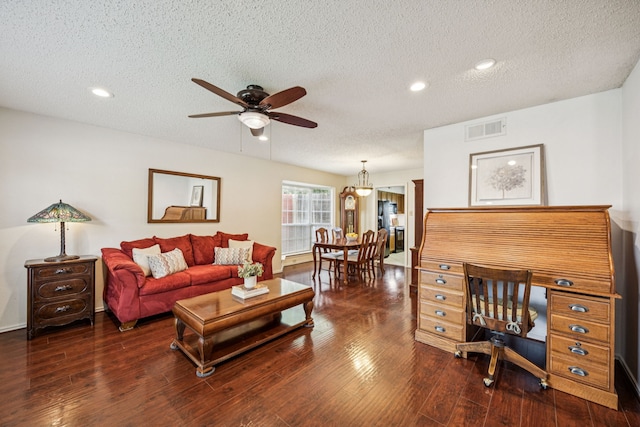 113 Windmill Ridge Dr, Rockwall, TX 75032 - living room featuring a ceiling fan, a textured ceiling, wood finished floors, and recessed lighting
